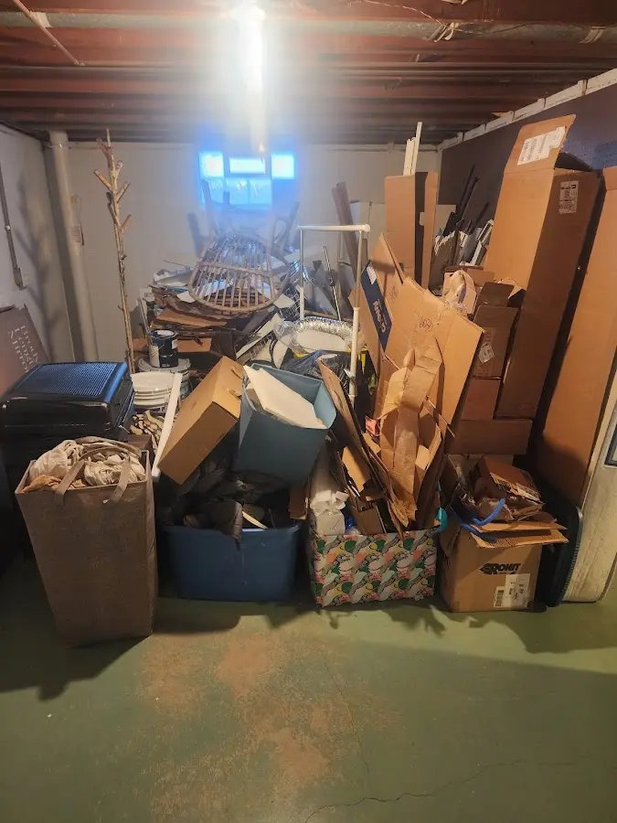 Roll-off dumpster container at job site for 2 Yard Dumpster Rental in Alden